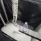 Octopus-inspired robot arm can grab and lift a toy shark using suction